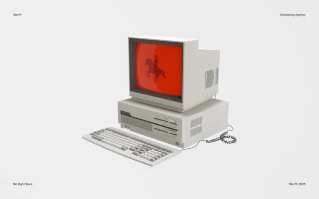 A retro computer with a cowboy showing on the screen